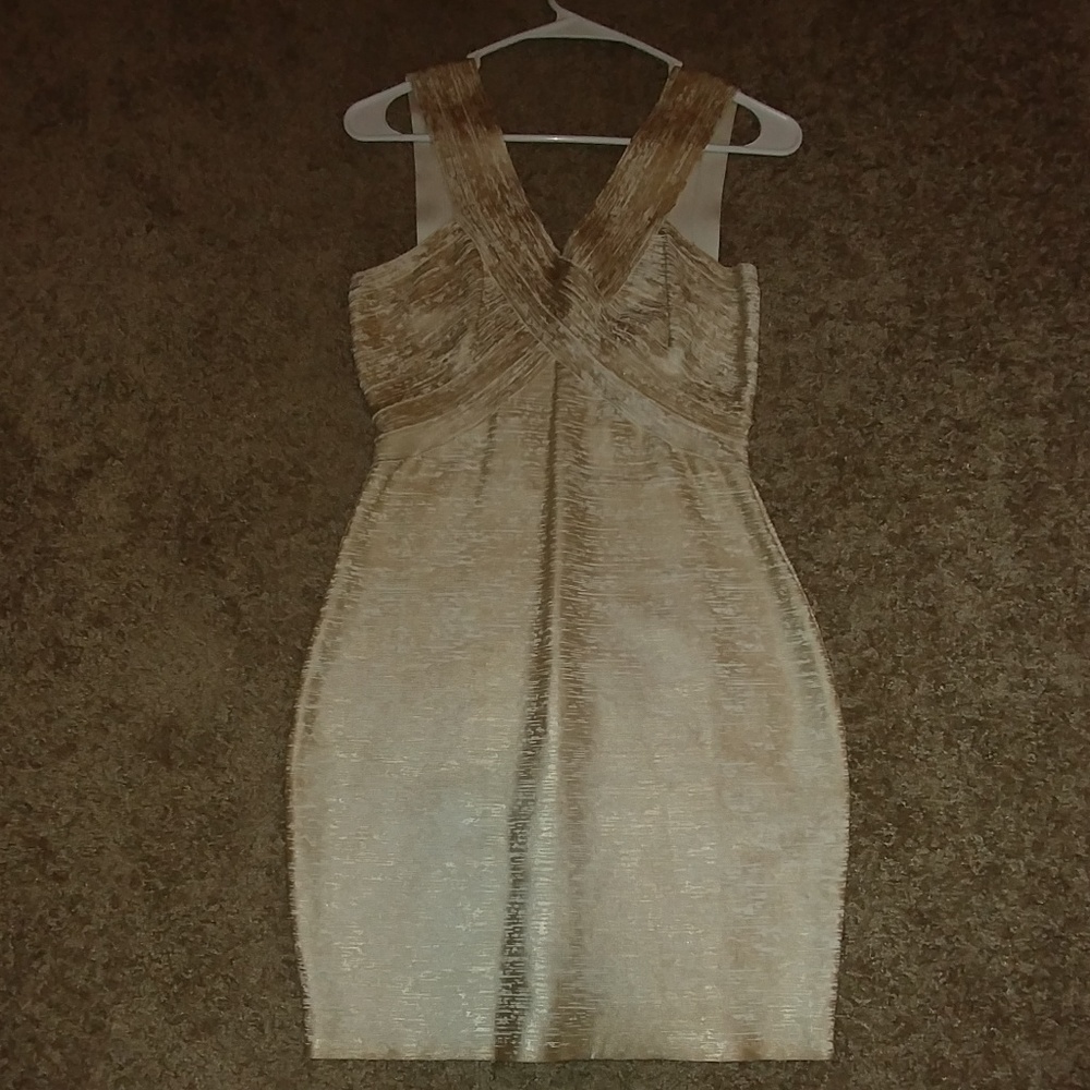 Gold and white bebe bandage dress.